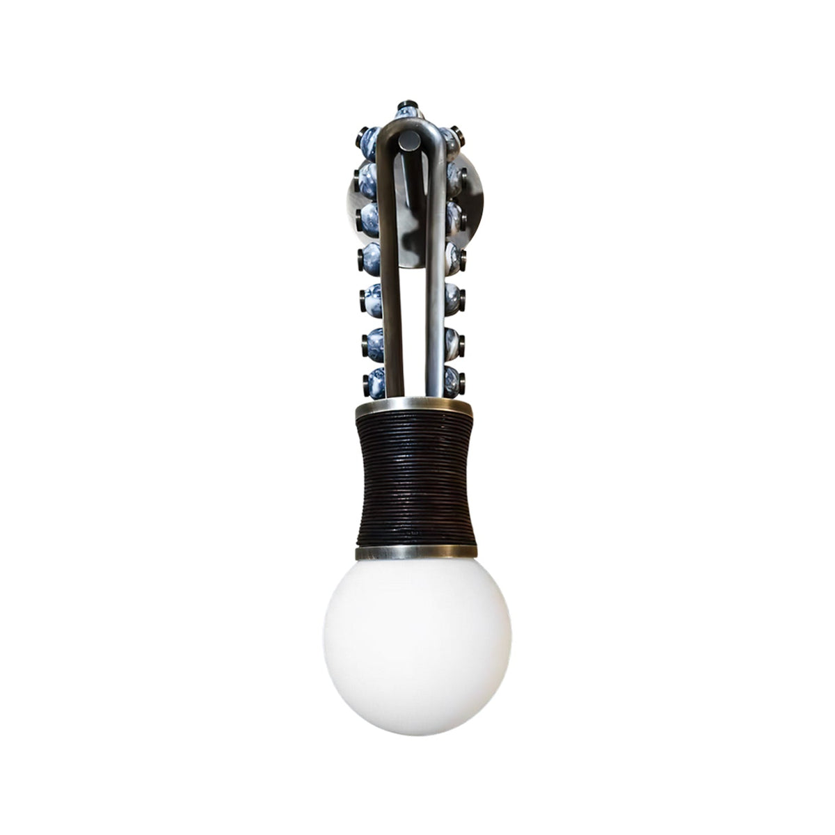 Clérachic wall light with speckled grey stone beads on a brass frame and a dark-wrapped base, shown alone on white.