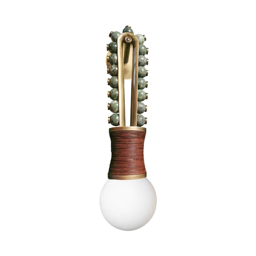 Clérachic wall light in sage-green stone beads on a brass frame, its socket bound in brown cord, photographed on a white background.