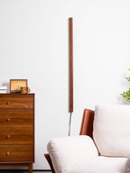 Wood wall light shown ceiling mounted with even glow