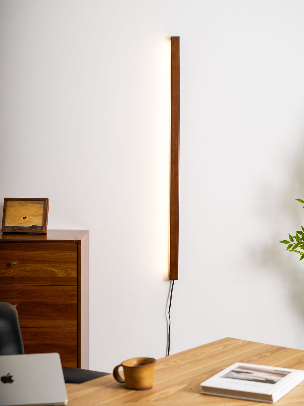 Round wood wall light close detail of natural grain