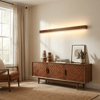 Linear wall light with natural wood frame on white background