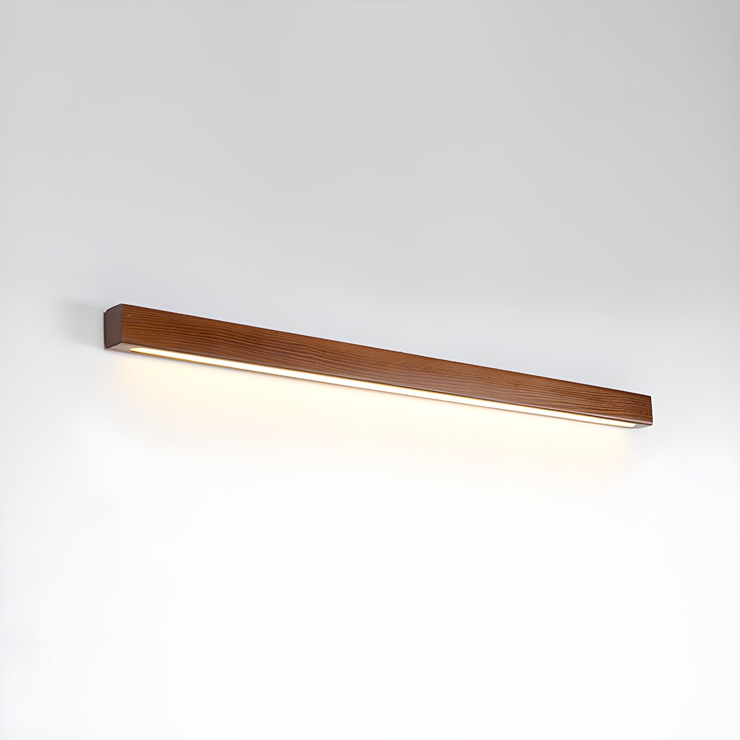 Natural wood linear wall light mounted horizontally on a wall