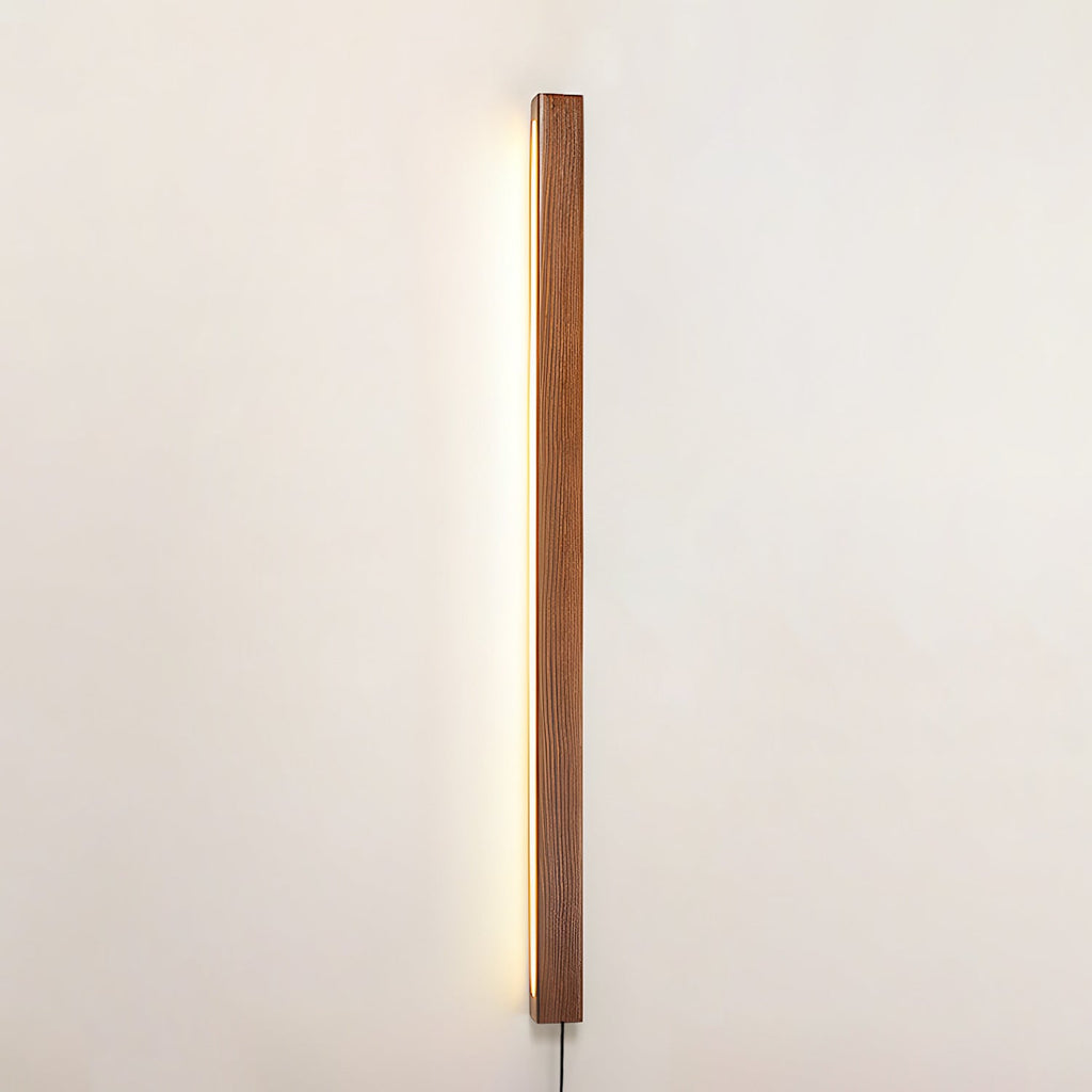 Wood wall light shown at an angle revealing its slim depth