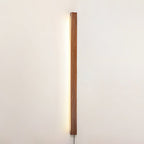 Wood wall light shown at an angle revealing its slim depth