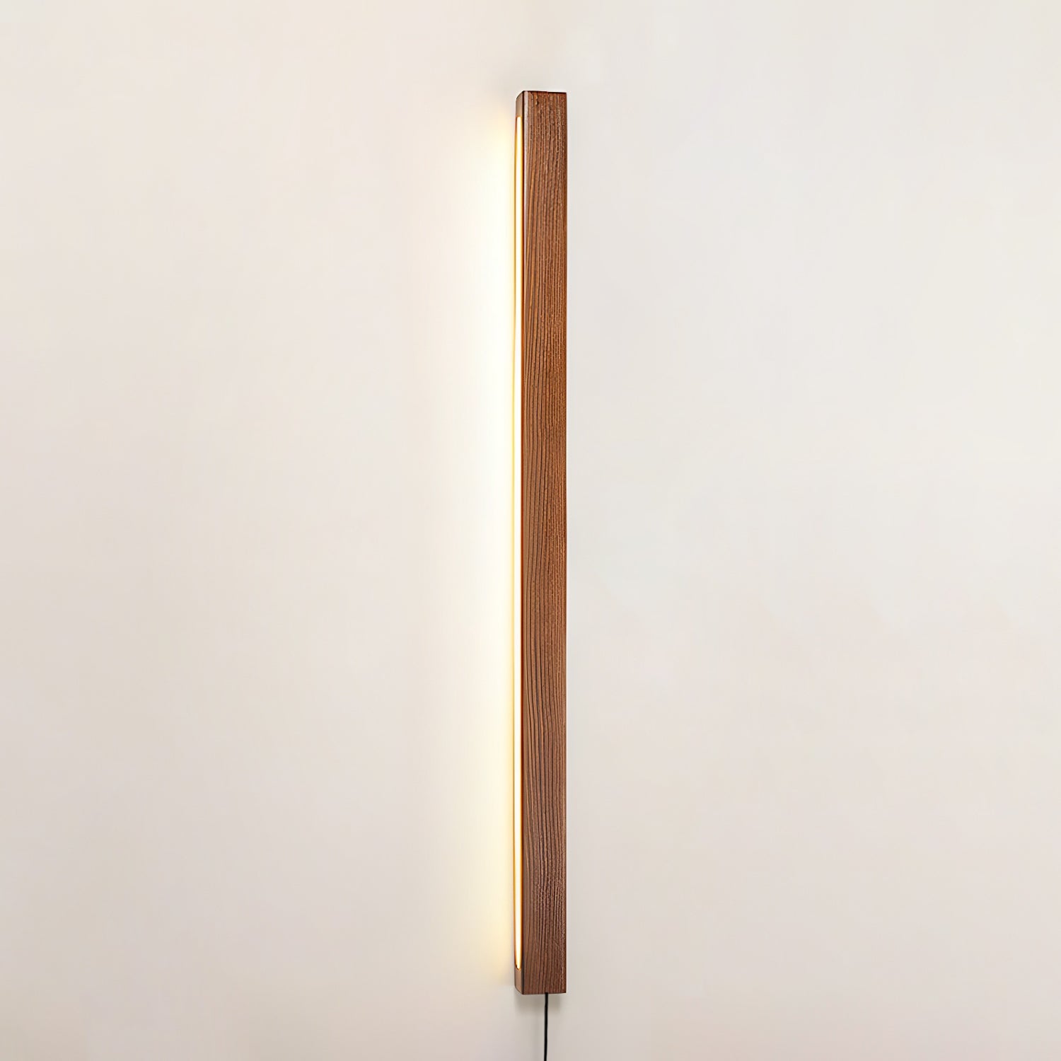 Wood wall light shown at an angle revealing its slim depth