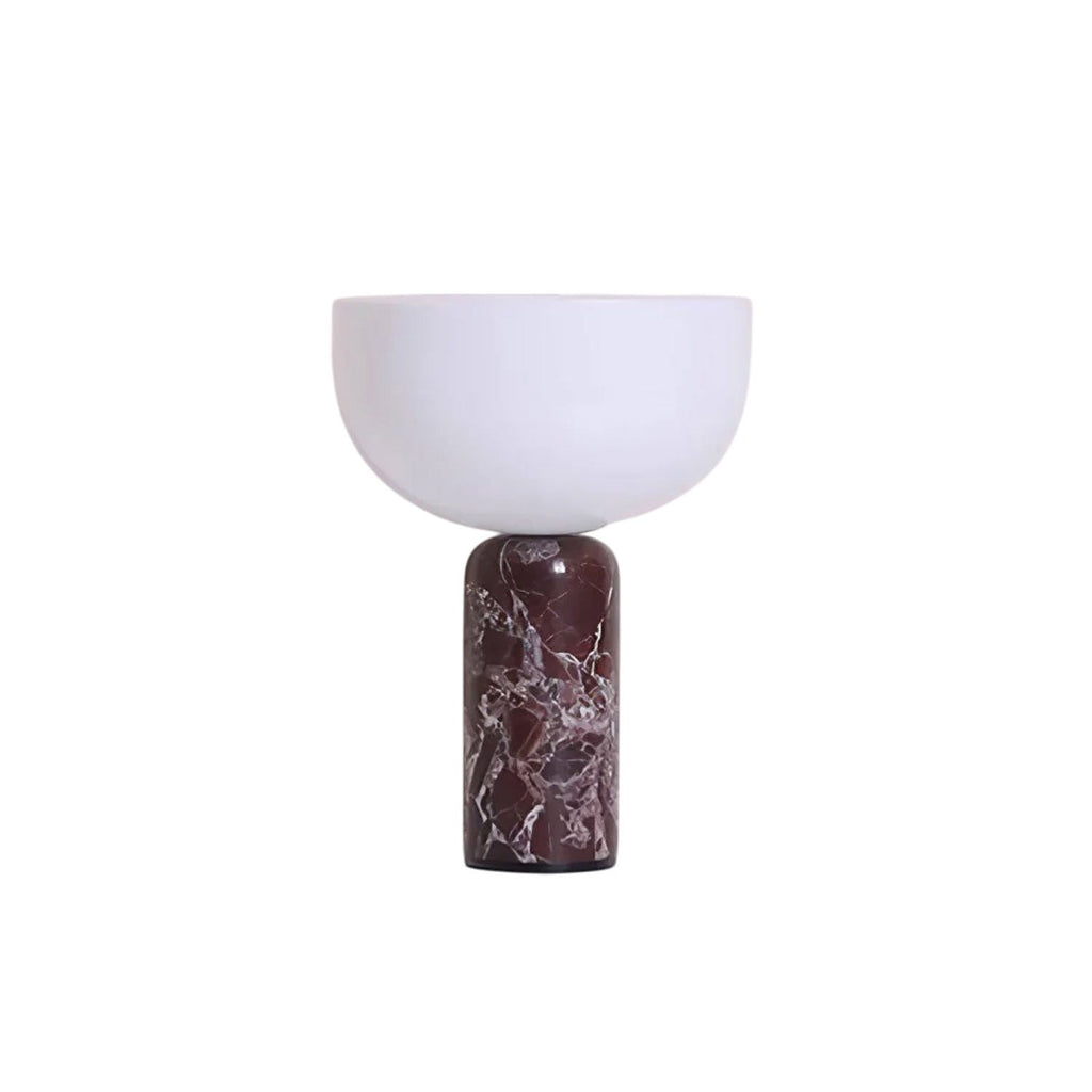 This Clérachic sphere table lamp in dark red marble, photographed alone against a plain white studio background.