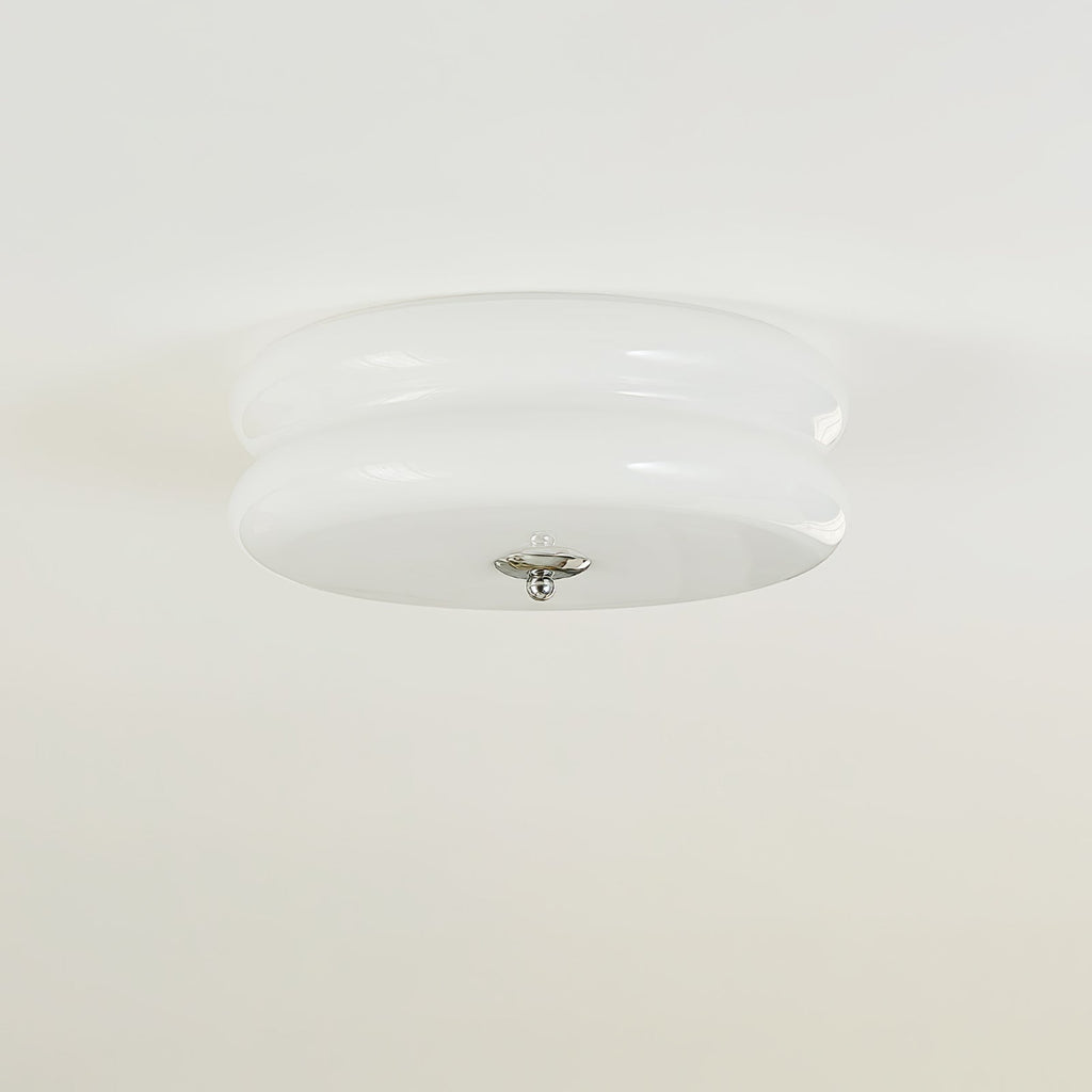 Vintage-style ceiling light casting warm glow in an interior