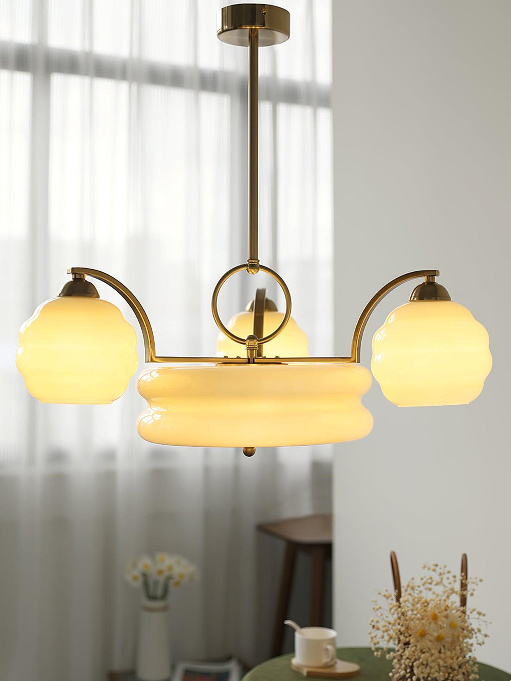 Art Deco chandelier with vintage glass shades in interior view