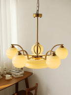 Art Deco chandelier suspended above an entryway setting