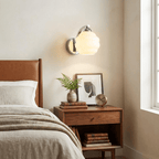 Art Deco wall sconce close detail of curved glass shade