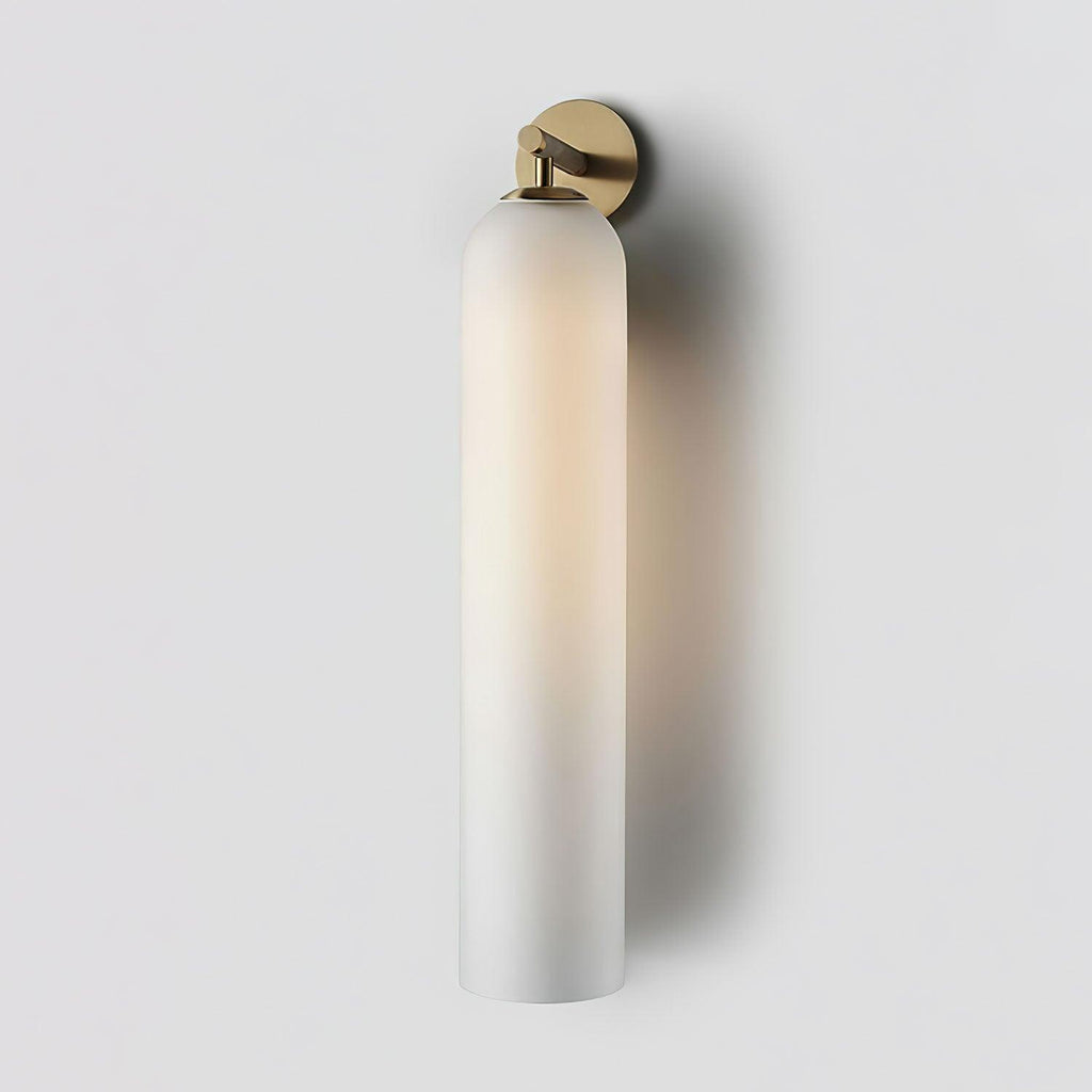 Mouthblown glass wall sconce with slim metal base mounted upward