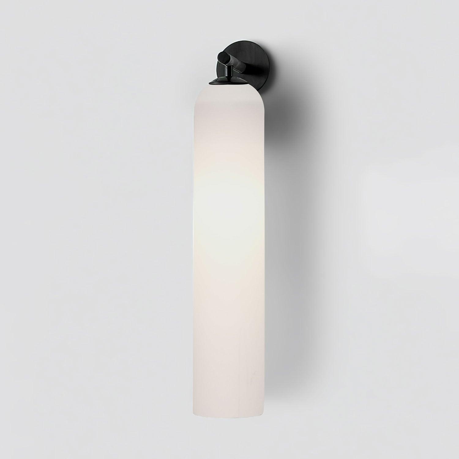 Cylindrical glass wall light with metal hardware, detail shot