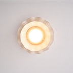 Pleated wave fabric ceiling light installed on a ceiling