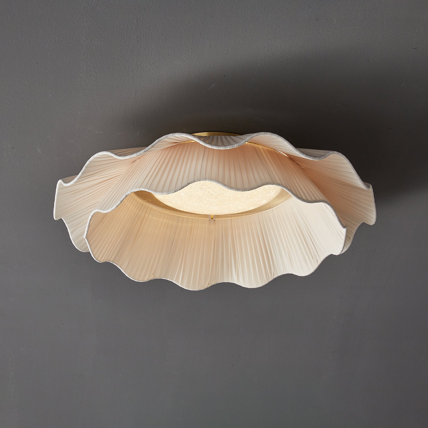 Pleated wave fabric ceiling light with folded beige shade