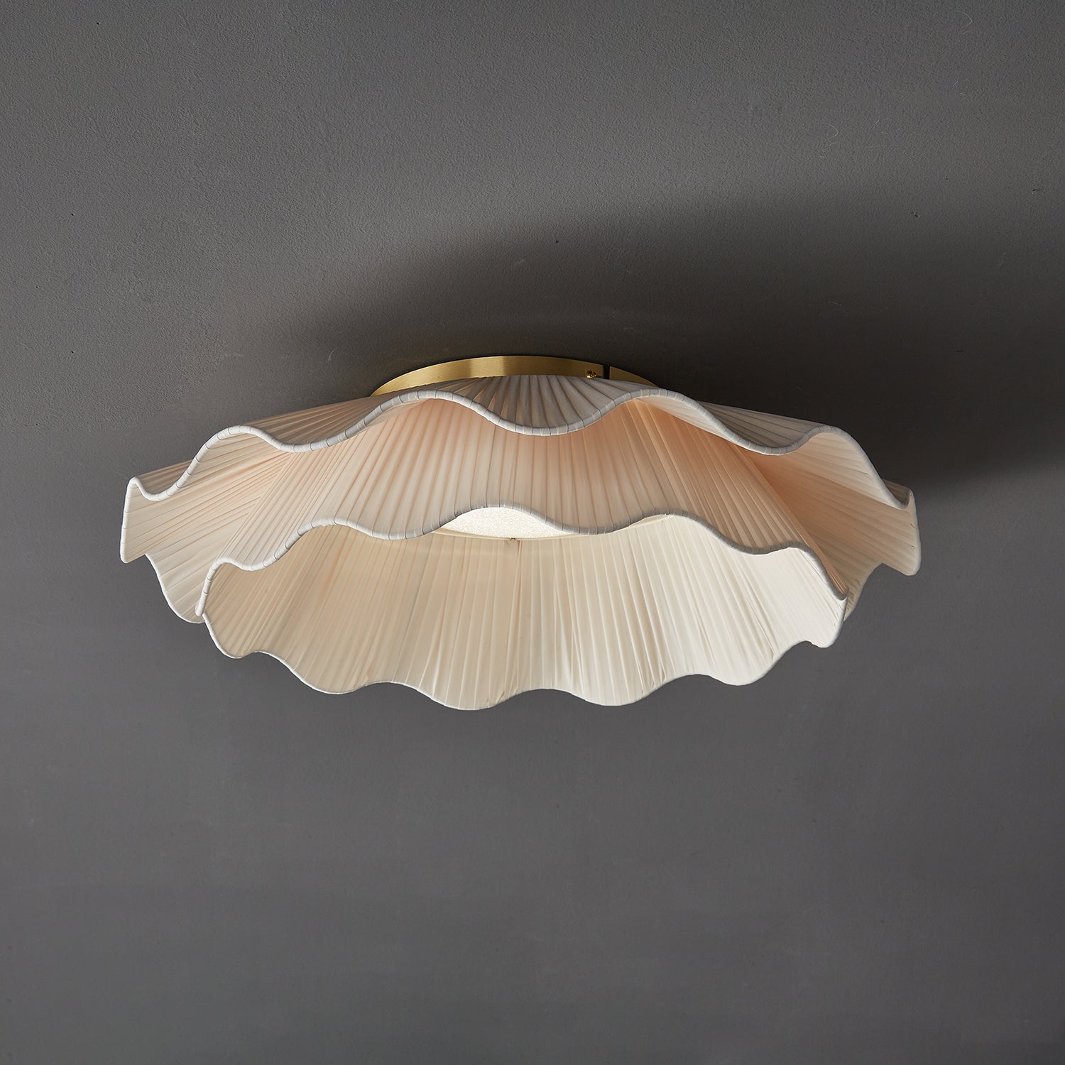 Pleated wave fabric ceiling light with soft folded shade