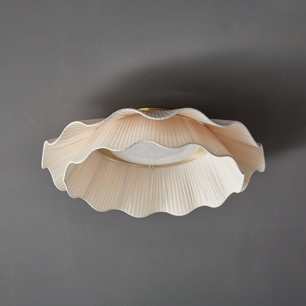 Pleated wave fabric ceiling light with soft ambient glow