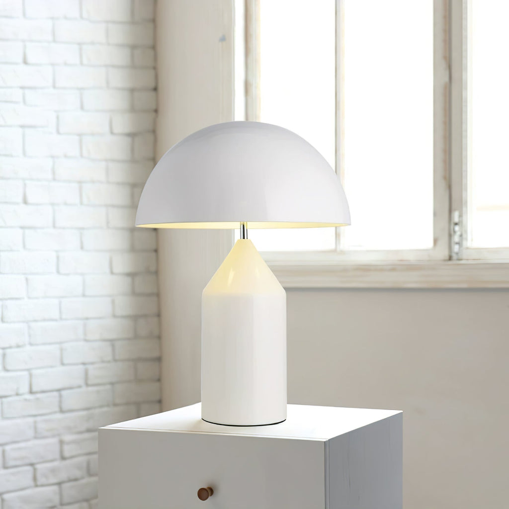 Sculptural metal table lamp in a warm interior setting