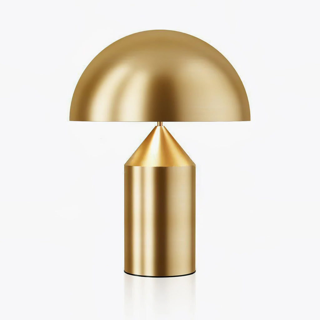 Sculptural metal table lamp in a warm copper finish