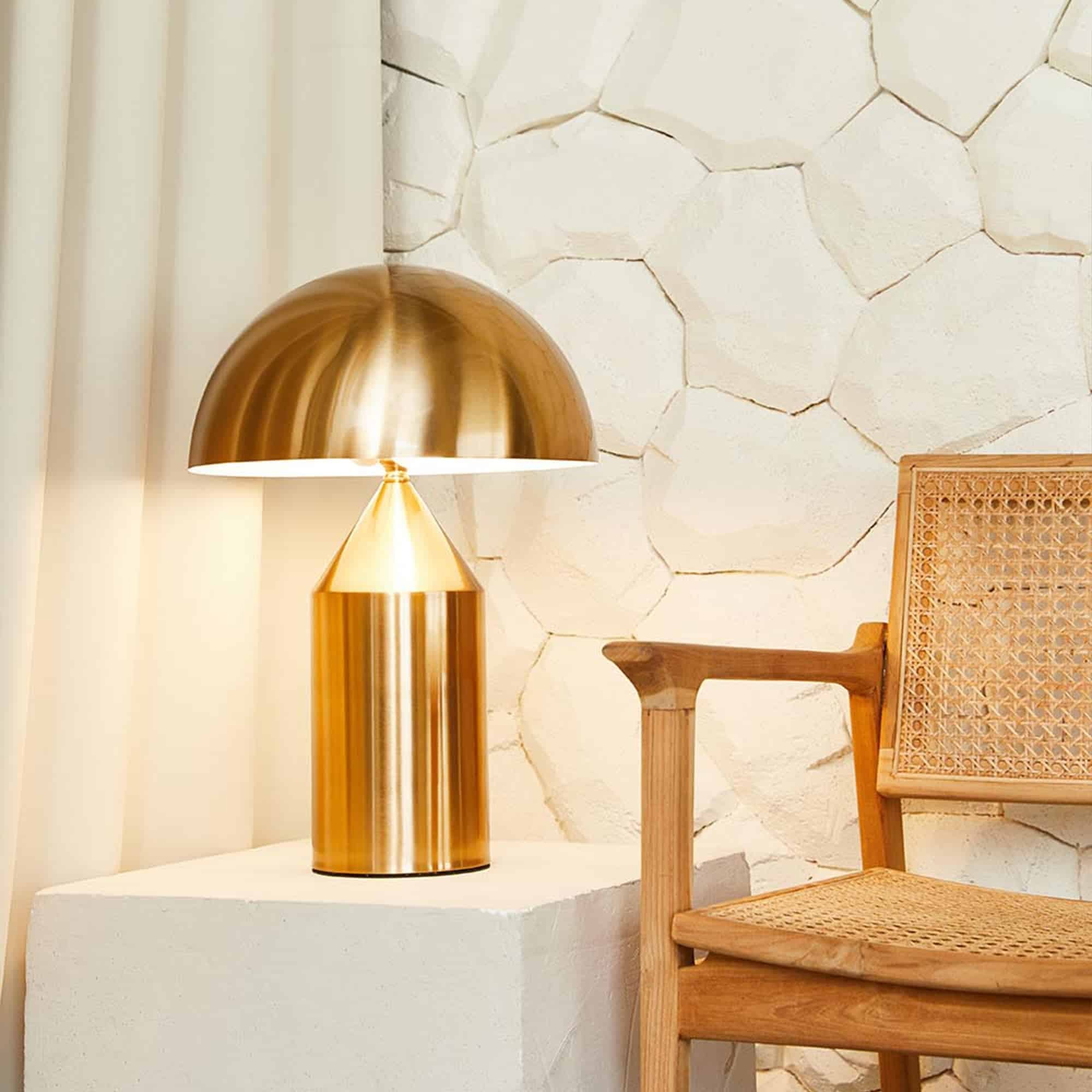 Sculptural metal table lamp with clean cylindrical base