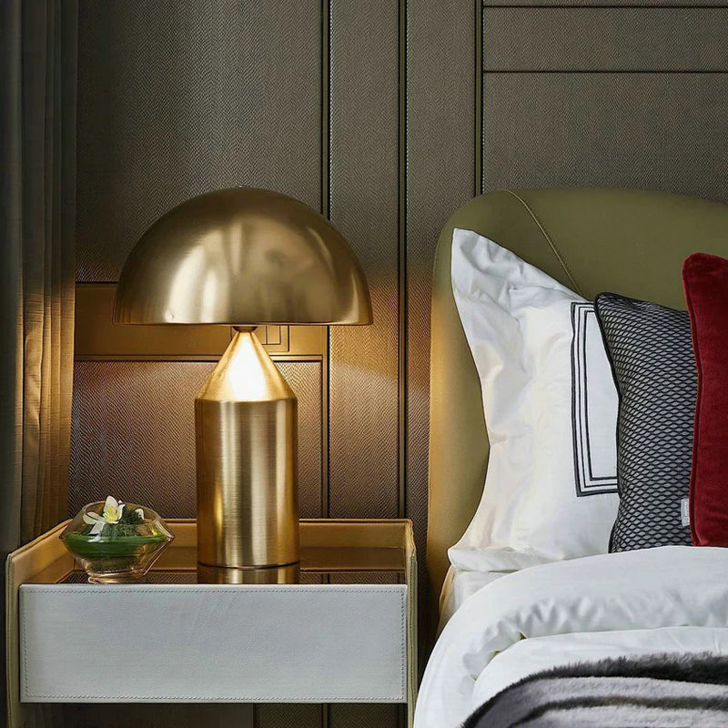 Sculptural metal table lamp with stacked geometric silhouette