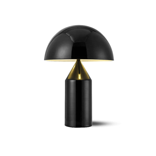 Sculptural metal table lamp showing cone and dome shapes