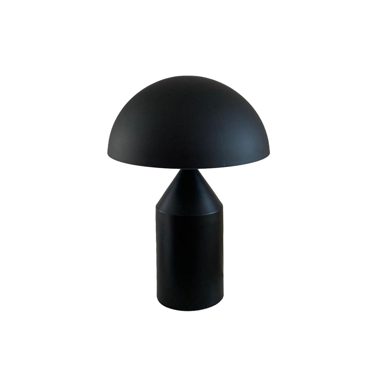 Sculptural metal table lamp viewed from the side