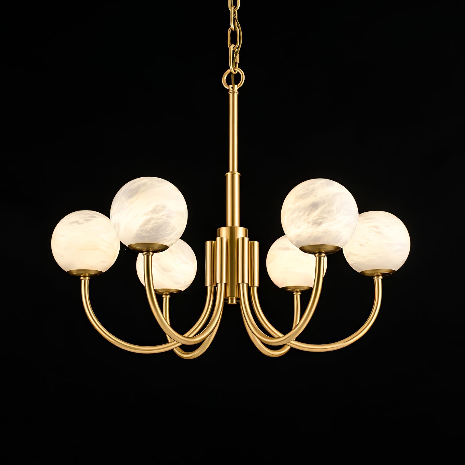 Close view of the Clérachic chandelier's fluted brass column and hanging chain, alabaster globes lit on curved arms