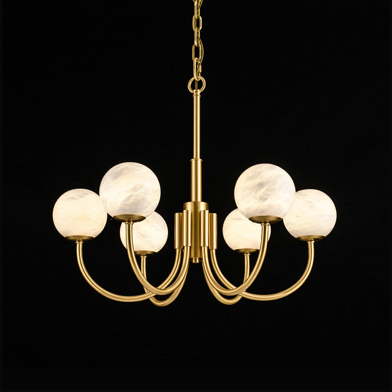 Clérachic compact studio shot on black with the alabaster globes unlit, showing their matte stone surface