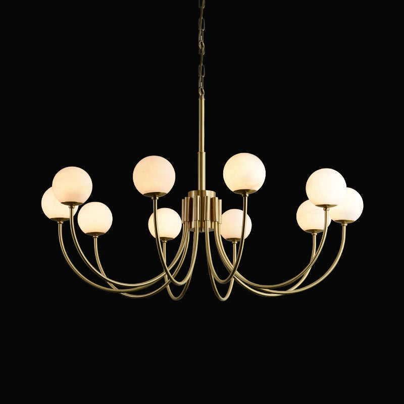 The Clérachic ten-light configuration seen head-on, brass arms interlacing beneath a low ring of stone globes