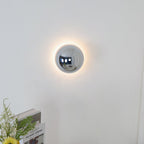 Polished sphere wall sconce close detail of gold finish