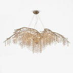 The largest gold version on white, its long branches spanning the width of the frame.