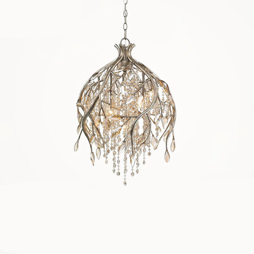 The bell-shaped gold cage on white, viewed straight on with its beads hanging free.