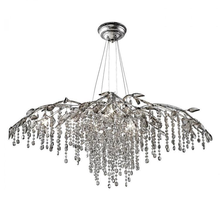 The broad silver version, densely hung with clear bead strands below the lit branches.