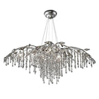 The broad silver version, densely hung with clear bead strands below the lit branches.