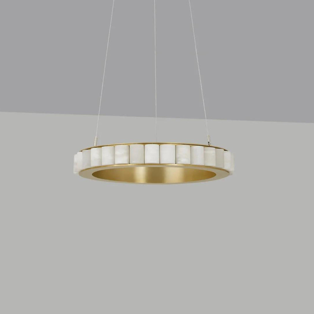 Brass alabaster chandelier against a grey backdrop, unlit, showing the polished inner ring.