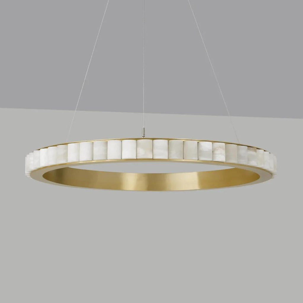 Large brass alabaster chandelier unlit on a grey backdrop, deep brushed gold inner band on show.