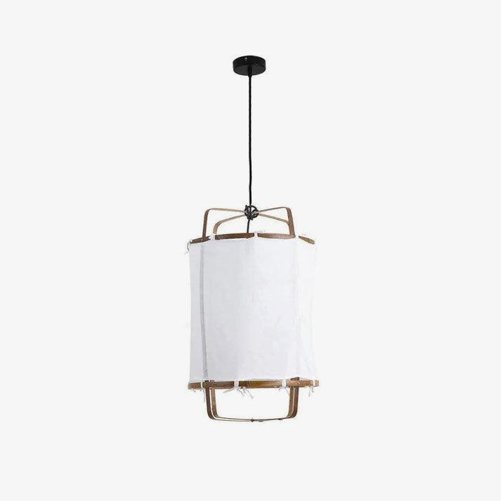 Bamboo and linen pendant light glowing in a warm room