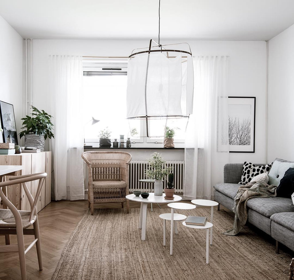 Bamboo pendant light with linen shade and warm bulb glow