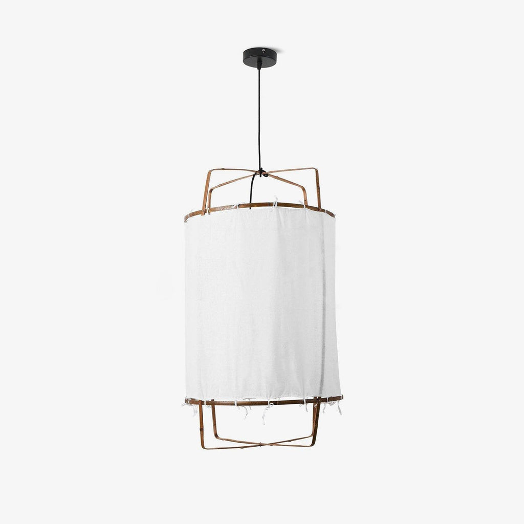 Bamboo pendant light with linen shade over a dining table