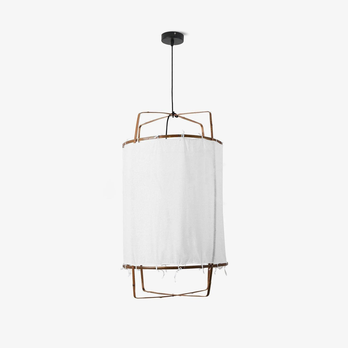 Bamboo pendant light with linen shade over a dining table