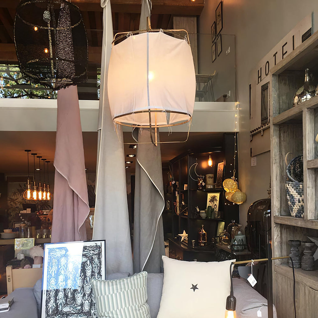 Bamboo pendant light glowing warm in a calm space