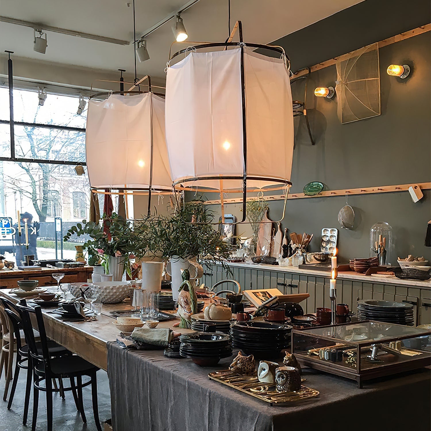 Bamboo and linen pendant light casting textured warm light