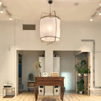 Bamboo pendant light glowing in a relaxed interior setting