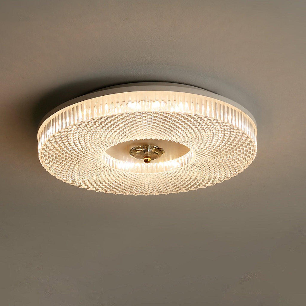 Slim flush mount ceiling light with white acrylic diffuser glowing