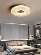 Round flush mount ceiling light glowing in a hallway