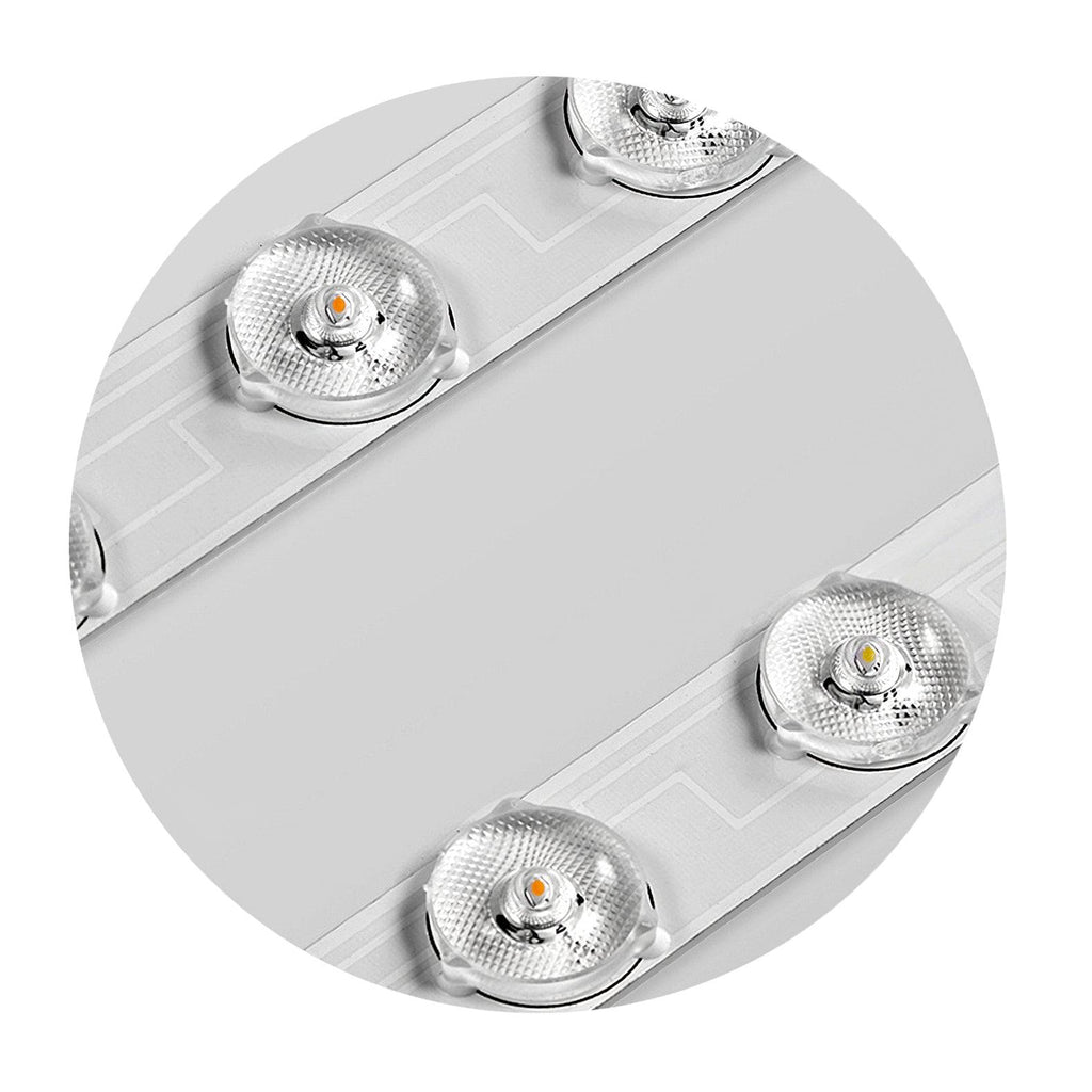 Slim LED flush mount ceiling light lit in a bedroom