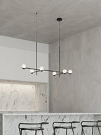 Gold finish Baer pendant light detail with white glass shade