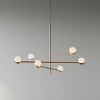 Close view of white glass shade on the Baer pendant light