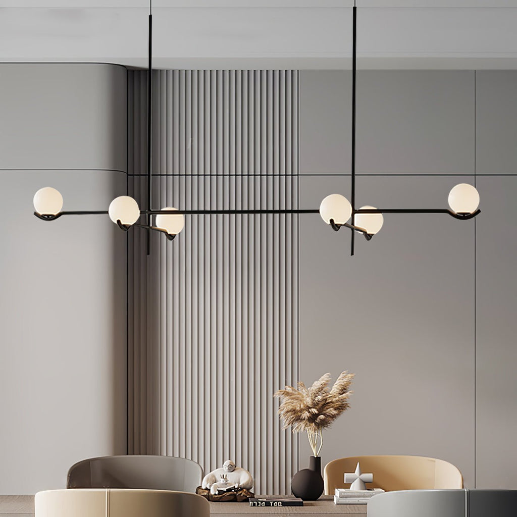 Baer pendant light with white glass shades in a bright room