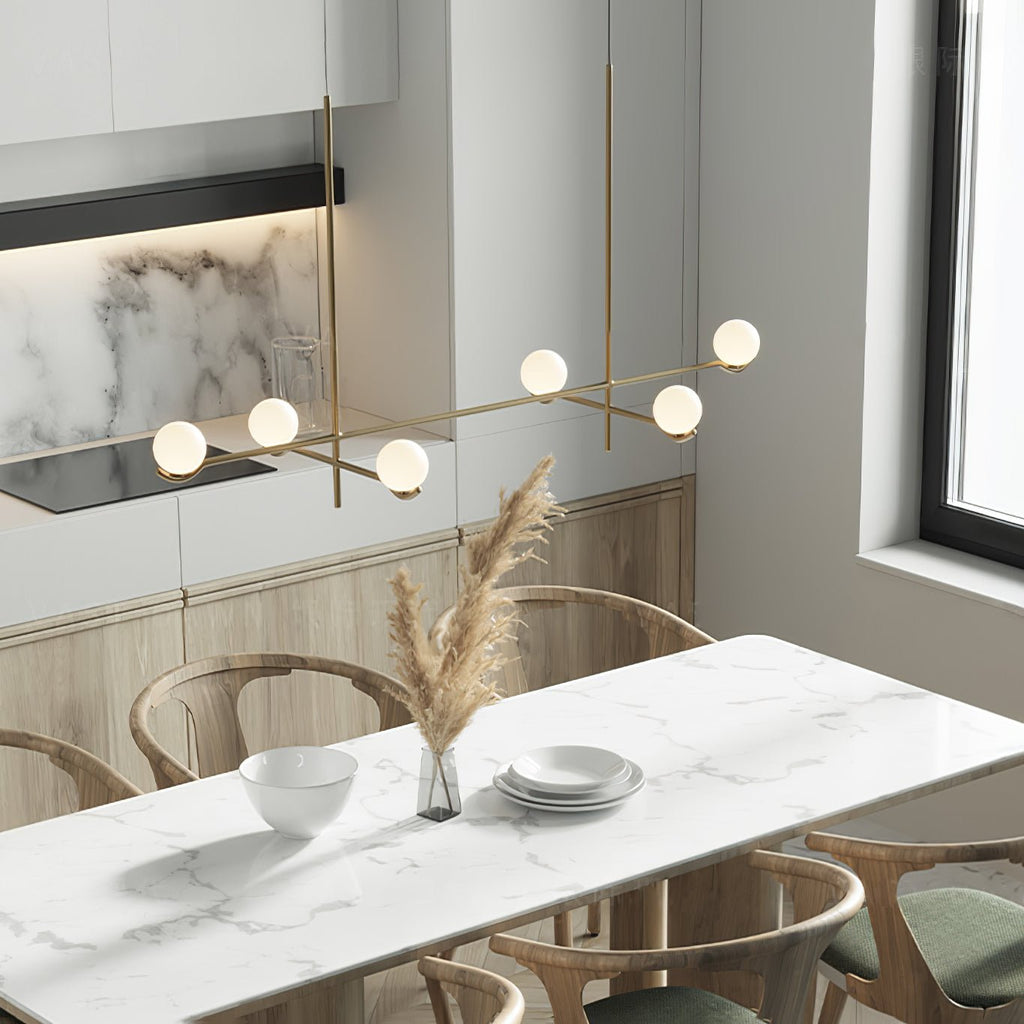Baer pendant light glowing white glass against a dark wall
